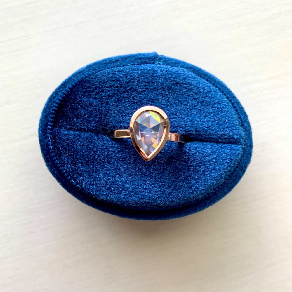 2.11 carat rose cut pear moissanite in 10k solid rose gold